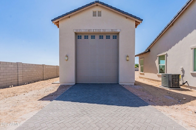 garage featuring central air condition unit