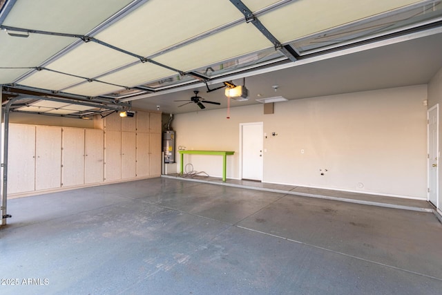 garage with a garage door opener and water heater