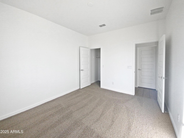 unfurnished bedroom with carpet