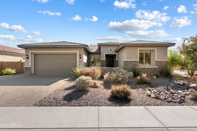 prairie-style home with a garage