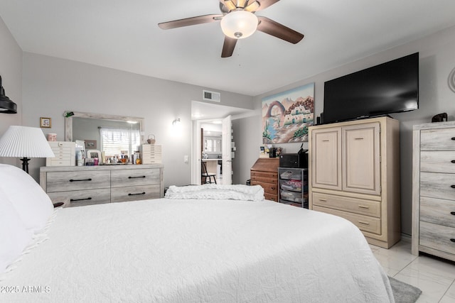 bedroom featuring visible vents, ceiling fan, and marble finish floor