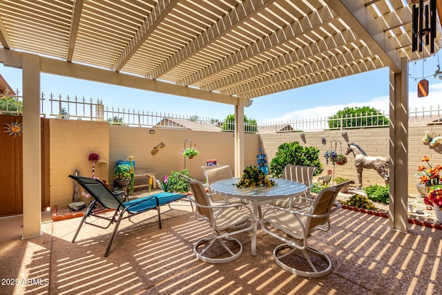 view of patio / terrace with a pergola, outdoor dining area, and a fenced backyard