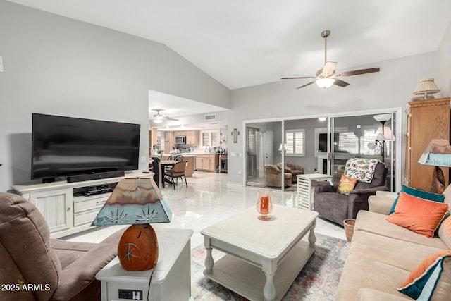 living room featuring visible vents, a ceiling fan, marble finish floor, and vaulted ceiling
