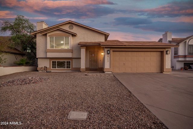 view of front of home featuring a garage