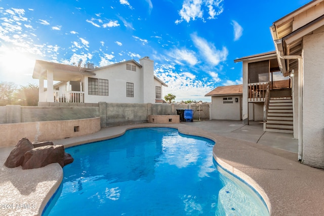 view of swimming pool featuring a patio