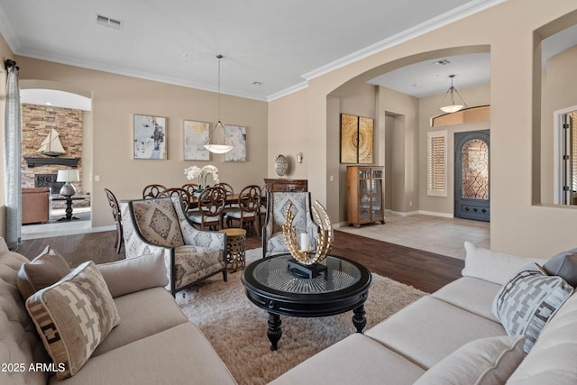 42034 N Harbour Town Ct, Anthem, AZ 85086 - living room with wood-type flooring and crown molding