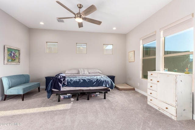 carpeted bedroom with ceiling fan