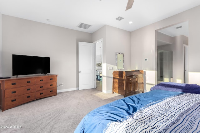 bedroom with light carpet and ceiling fan