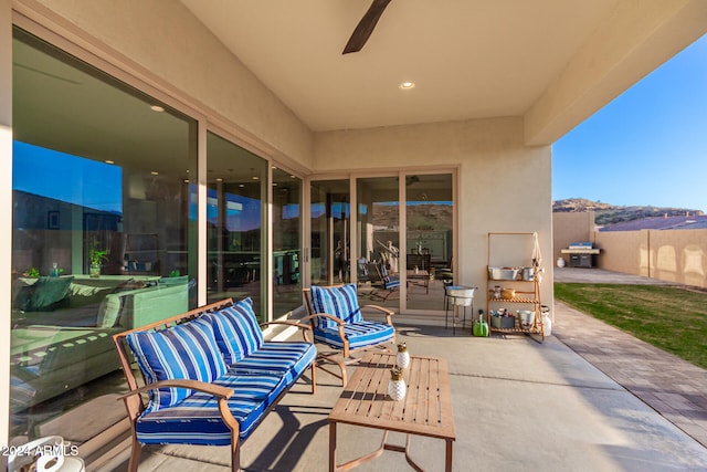 view of patio with ceiling fan and grilling area