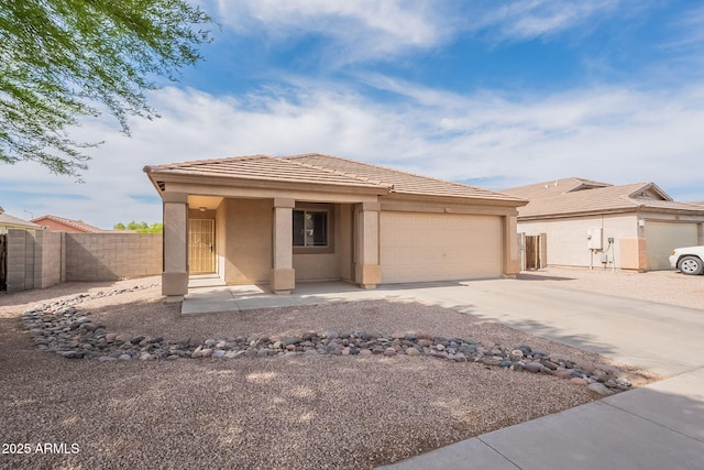 2518 W Carson Rd, Phoenix, AZ 85041 - view of front of property with stucco siding, a garage, concrete driveway, and a tiled roof