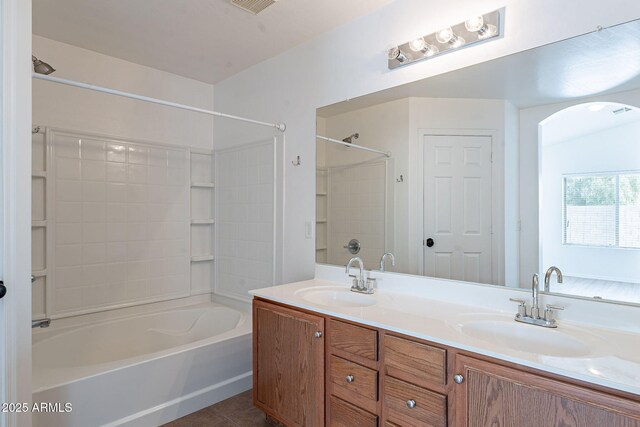 2518 W Carson Rd, Phoenix, AZ 85041 - full bathroom with double vanity, shower / bath combination, and tile patterned flooring