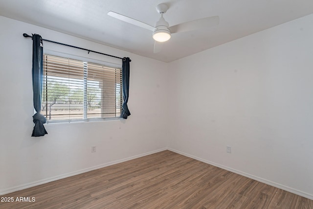 2518 W Carson Rd, Phoenix, AZ 85041 - unfurnished room featuring wood finished floors, baseboards, and ceiling fan
