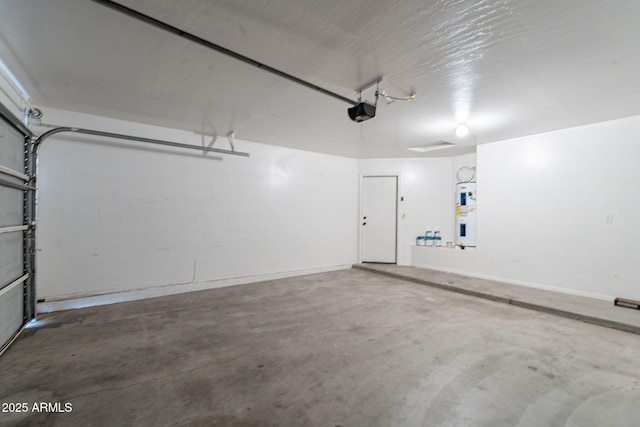 2518 W Carson Rd, Phoenix, AZ 85041 - garage with electric water heater and a garage door opener