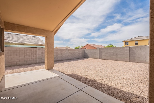 2518 W Carson Rd, Phoenix, AZ 85041 - fenced backyard with a patio area