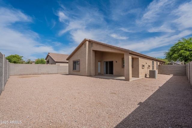 2518 W Carson Rd, Phoenix, AZ 85041 - rear view of property with stucco siding, central air condition unit, a patio area, and a fenced backyard