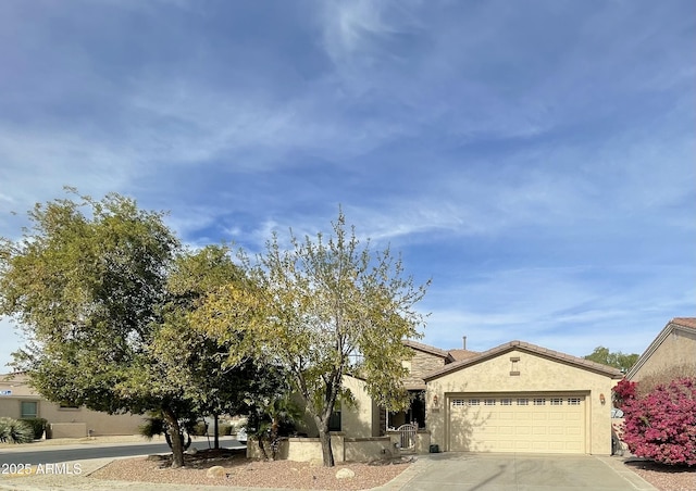 view of front of home with a garage