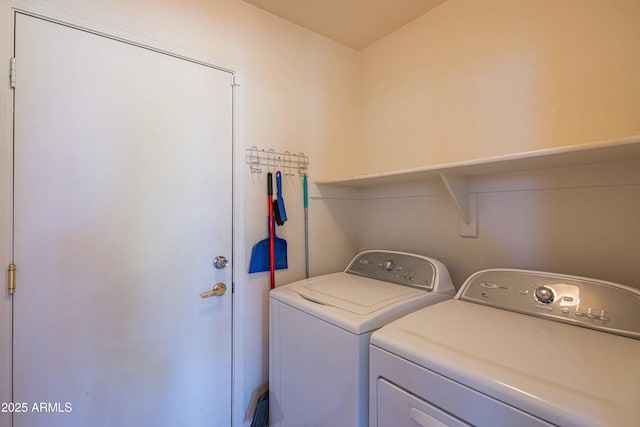 washroom with independent washer and dryer