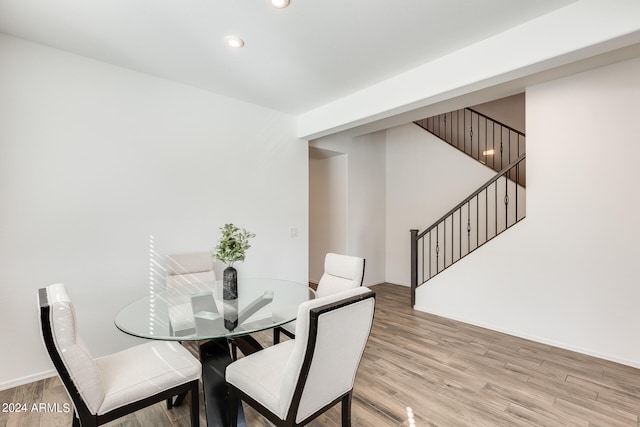 dining room with light wood-type flooring