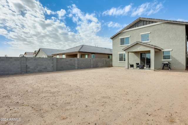 rear view of house with a patio area