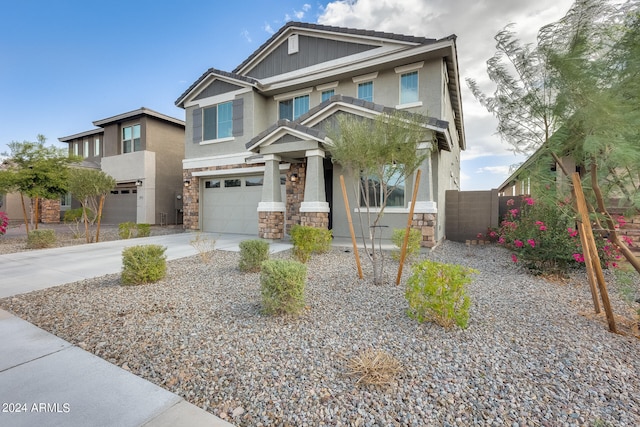 craftsman-style home with a garage