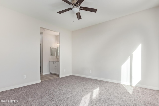 unfurnished bedroom with baseboards and carpet floors