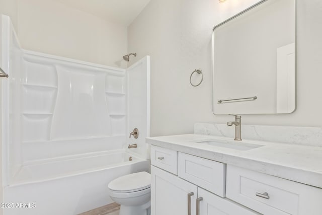 full bath with shower / bathing tub combination, toilet, and vanity