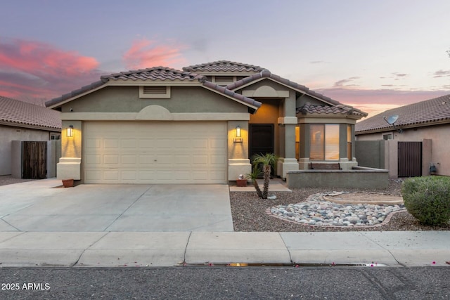 view of front of home with a garage