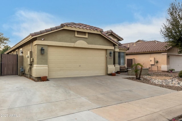 mediterranean / spanish-style house featuring a garage