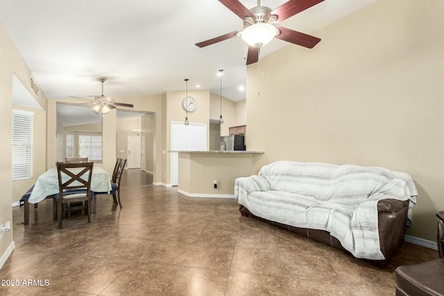 living room featuring lofted ceiling and ceiling fan