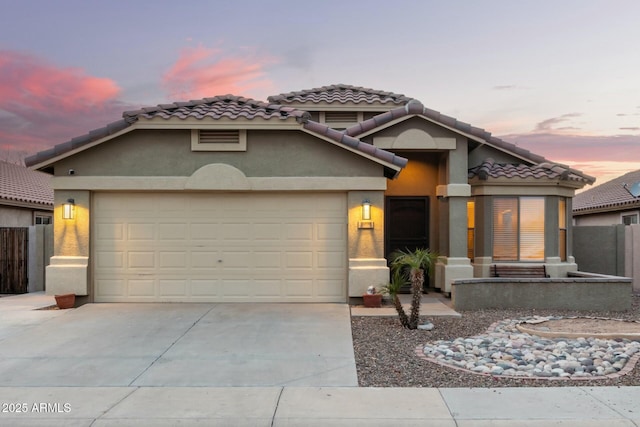 view of front of house with a garage