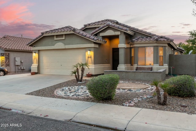 view of front of home featuring a garage