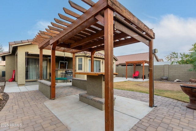 view of patio / terrace featuring a pergola