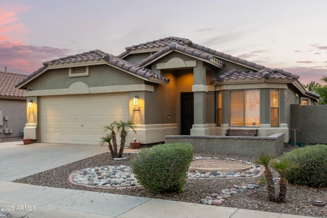 view of front of property featuring a garage