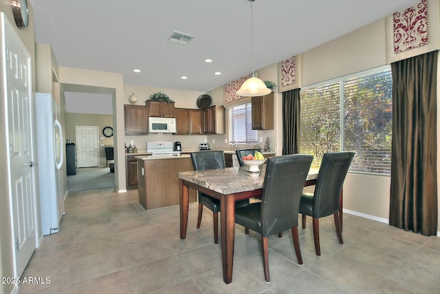 view of tiled dining area