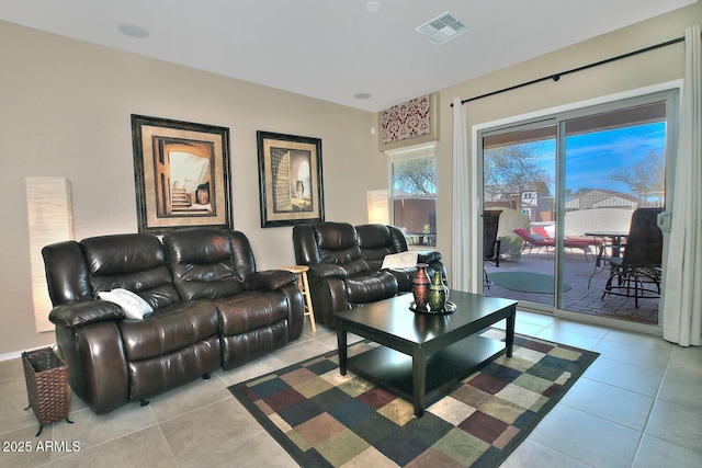 living room with light tile patterned flooring