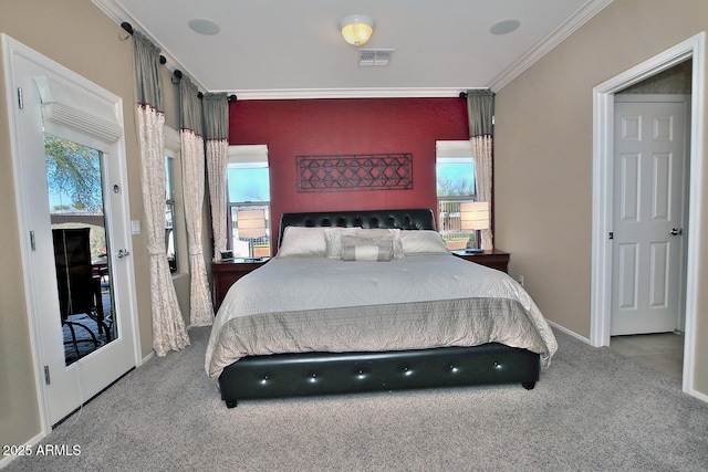 carpeted bedroom featuring ornamental molding