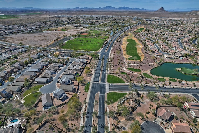 bird's eye view with a water and mountain view