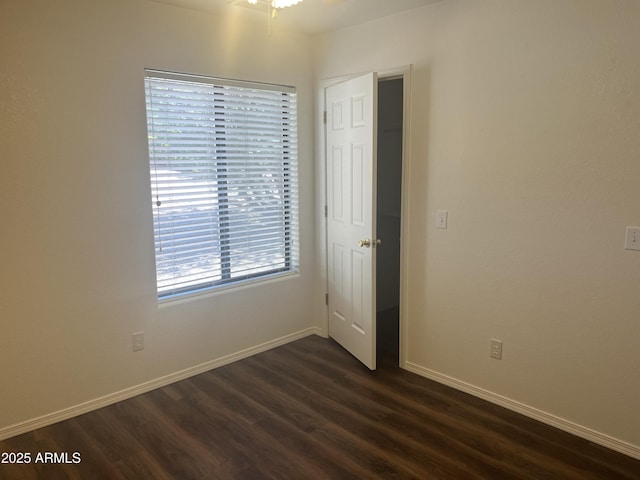 100 N Lariat Way, Payson, AZ 85541 - unfurnished bedroom with baseboards and dark wood-style flooring
