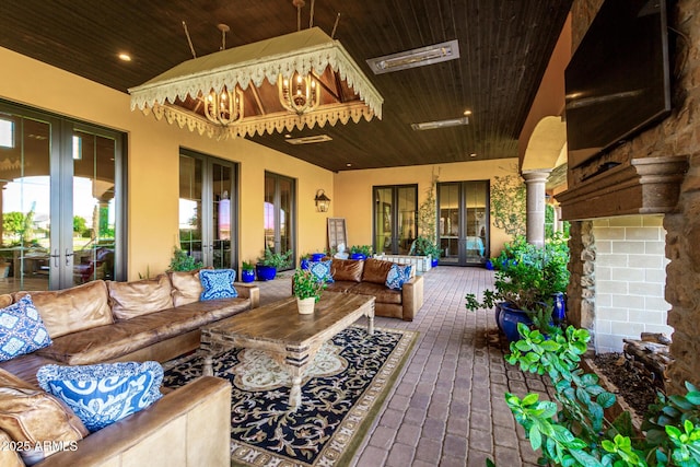 view of patio / terrace featuring outdoor lounge area and french doors