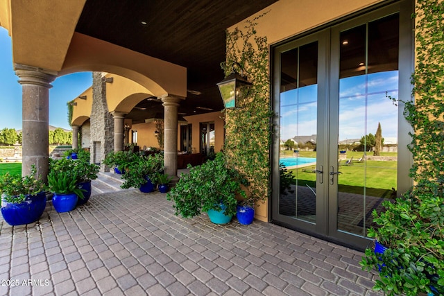 view of patio featuring french doors