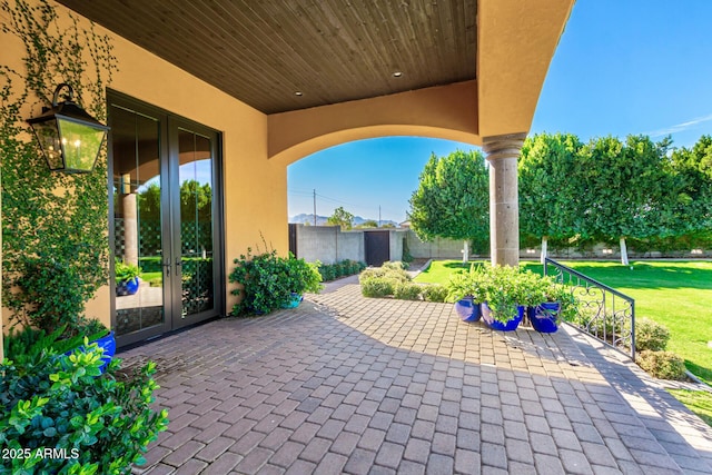 view of patio with fence and french doors