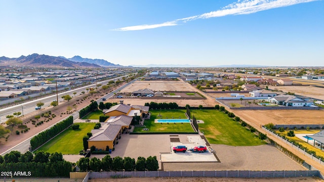 drone / aerial view with a residential view and a mountain view