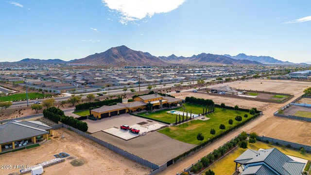 birds eye view of property with a residential view and a mountain view