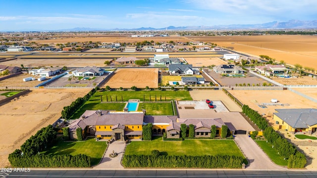 drone / aerial view with a residential view and a mountain view