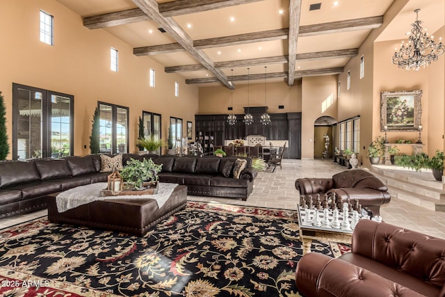 interior space with arched walkways, a towering ceiling, an inviting chandelier, coffered ceiling, and beamed ceiling