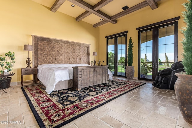 bedroom with baseboards, coffered ceiling, access to exterior, stone tile flooring, and beam ceiling