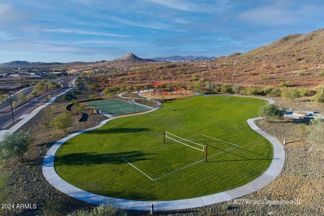 birds eye view of property featuring a mountain view