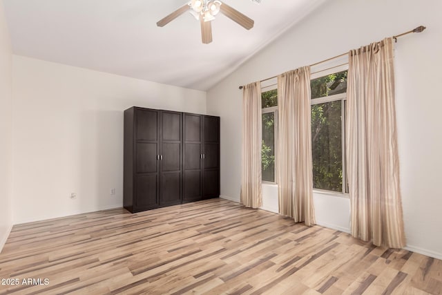 2741 E San Tan St, Chandler, AZ 85225 - unfurnished bedroom with lofted ceiling, light wood-type flooring, and a ceiling fan