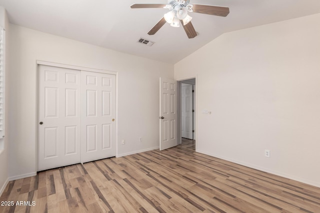 2741 E San Tan St, Chandler, AZ 85225 - unfurnished bedroom featuring lofted ceiling, light wood finished floors, a closet, and a ceiling fan