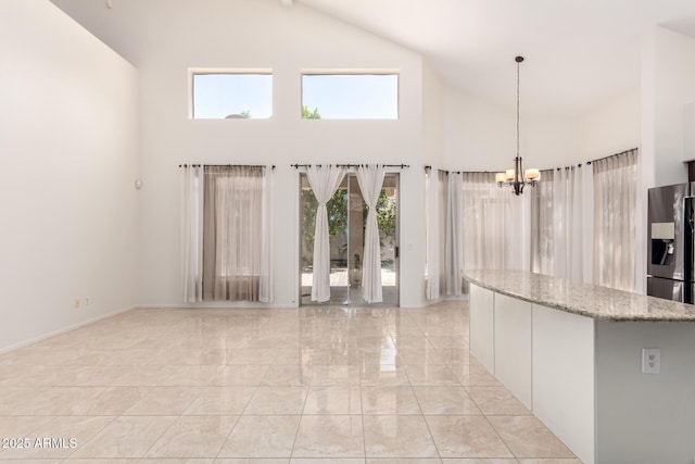 2741 E San Tan St, Chandler, AZ 85225 - foyer with high vaulted ceiling, a chandelier, and plenty of natural light